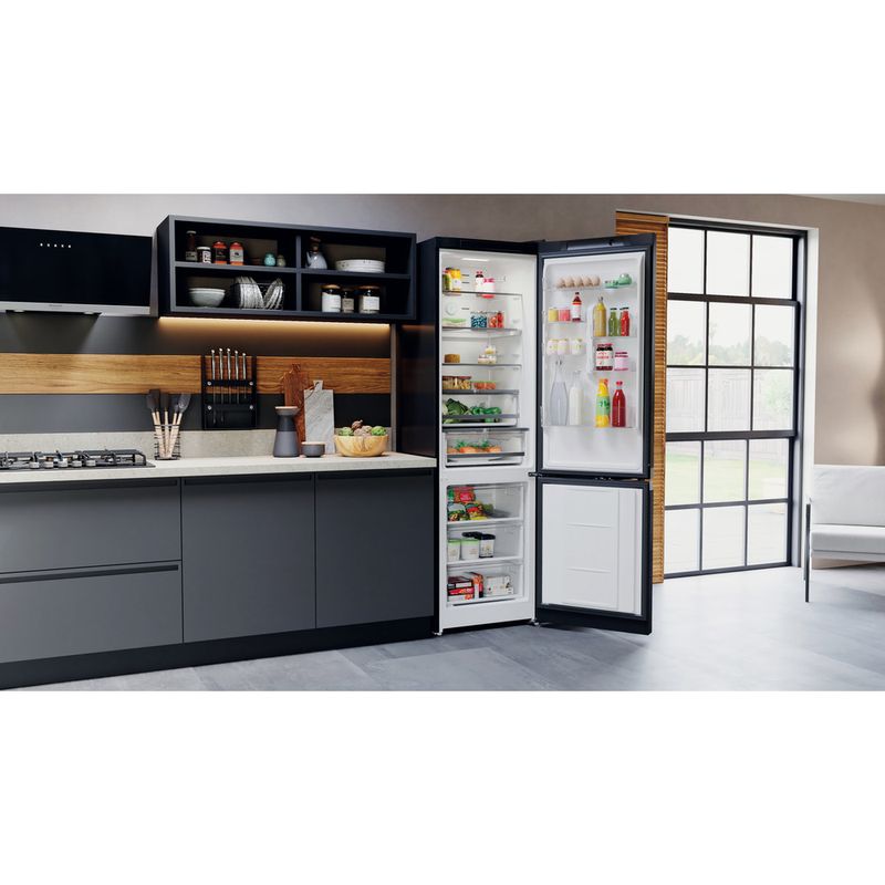 Hotpoint_Ariston-Комбинированные-холодильники-Отдельностоящий-HTS-8202I-BX-O3-Черная-сталь-2-doors-Lifestyle-perspective-open